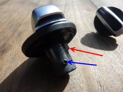 Remove the ridges as far as necessary to the fit button well in your unit (Red arrow). I've also mounted a Set screw (M3) opposite to the lens position